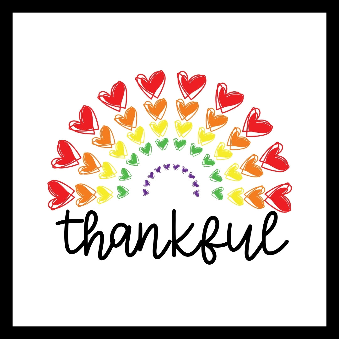 multi-colored hearts creating a rainbow with the word 'thankful' in black text on a white background.