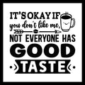 'It's okay if you don't like me, not everyone has good taste' in black text with a black and white smiling coffee mug and a coffee bean with an arrow, on a white background.