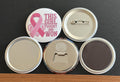 Round white magnet with the message 'This girl found and won'' in pink text with a pink breast cancer ribbon.  Also in the photo are the four options available for this magnet which include a pin back button, pocket mirror, magnetic bottle opener and magnet.  This image was photographed on a black background.